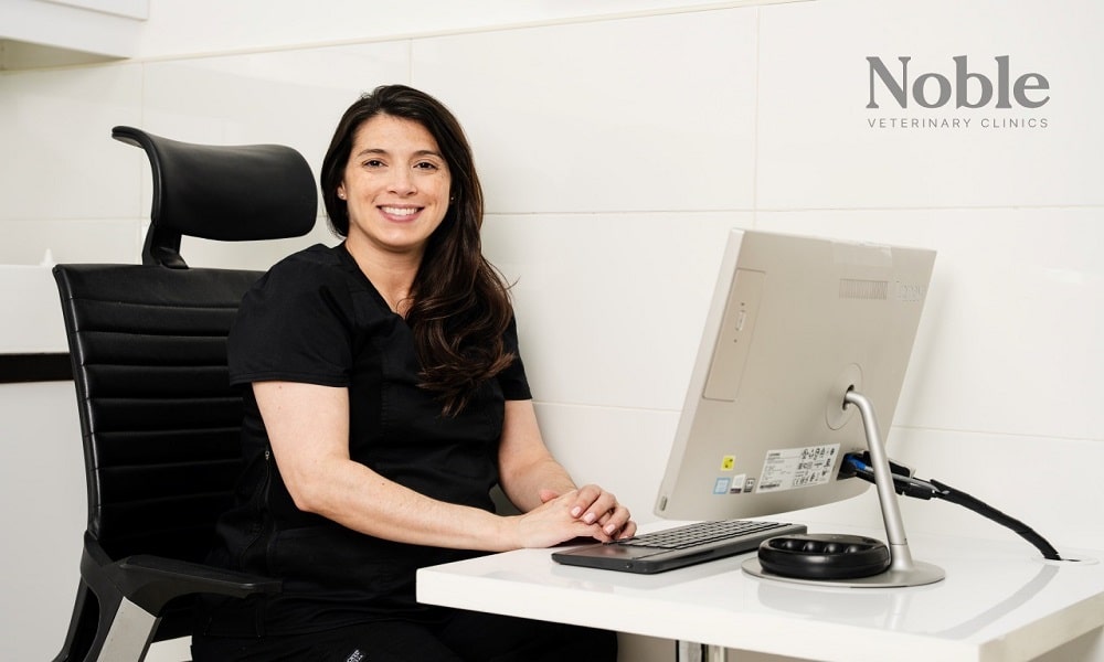 A licensed veterinarian in Dubai is waiting for her next patient at the veterinary clinic.