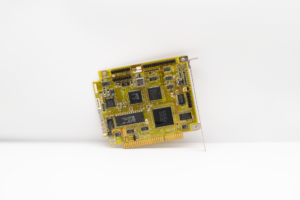 Antique circuit board showcasing vintage computing technology, isolated on a white background.